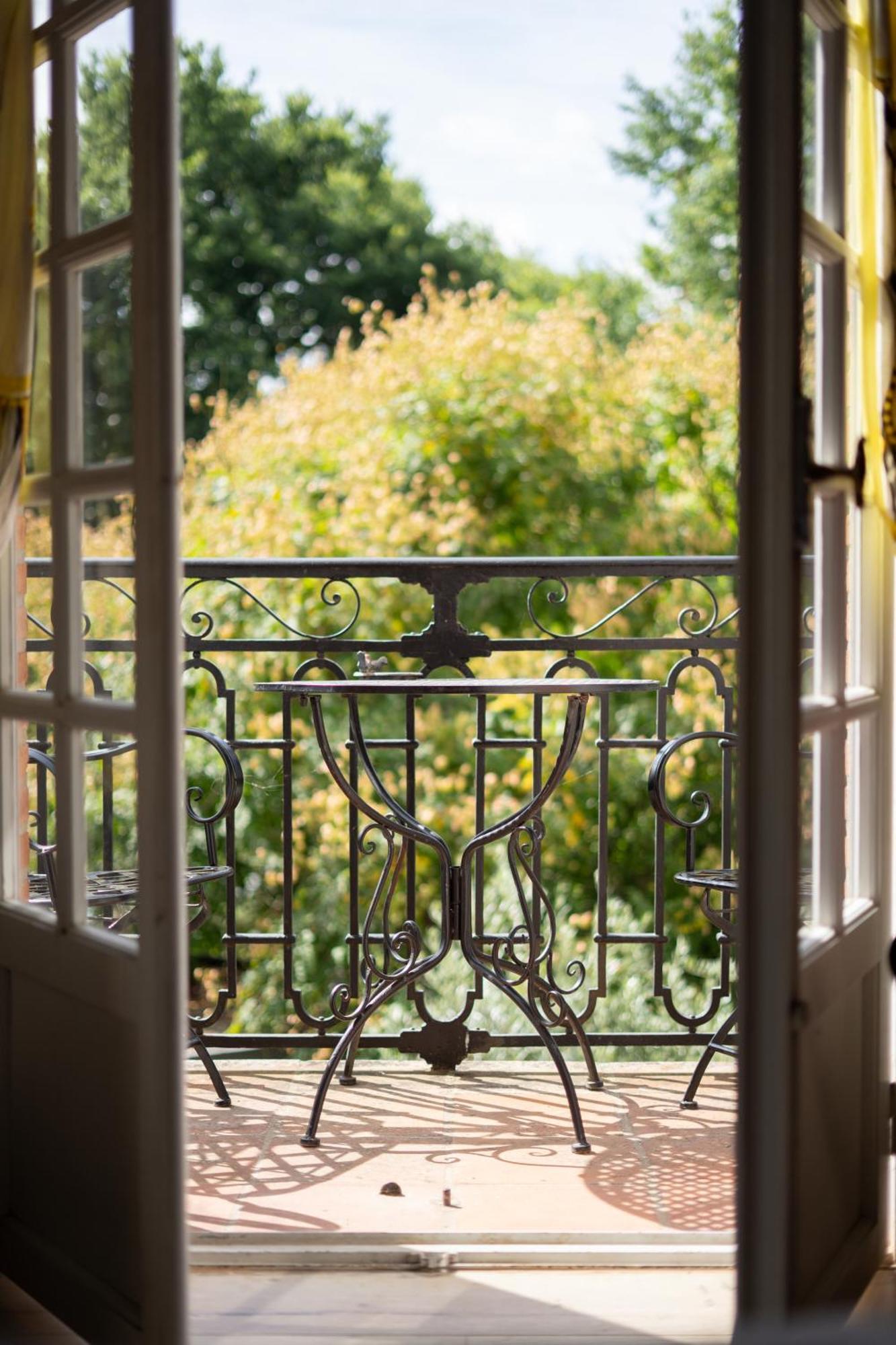 Castel Bois Marie, Maison D'Hotes モントーバン エクステリア 写真 A balcony